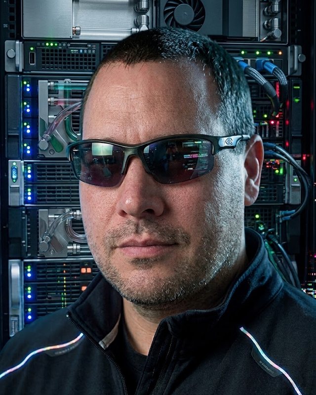 John G, founder of Win Twin, in a server room